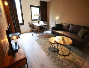 Living room - Family Apartment in Hambachtal Boutique Resort (Oberhambach)