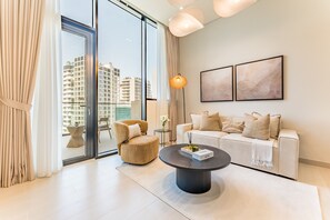 TV - 1BR Oasis Featuring a Private Mini Pool on the Balcony with Community Views (Dubai)