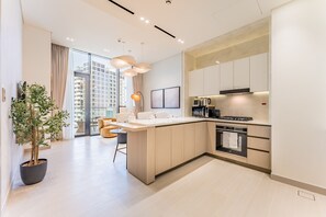Fridge, microwave, oven, stovetop - 1BR Oasis Featuring a Private Mini Pool on the Balcony with Community Views (Dubai)