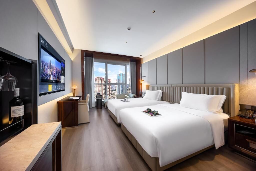 Quarto duplo básico, 2 camas de casal, serviço de arrumação | Vista do quarto