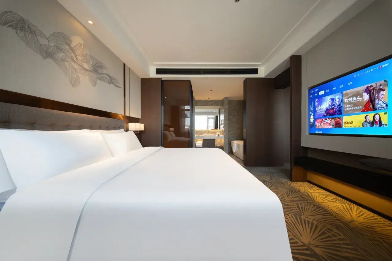 Morandi Suite | Desk, laptop workspace, blackout drapes, soundproofing