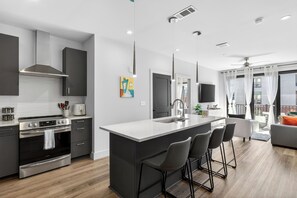Fridge, microwave, oven, stovetop - Stylish Condo • Pool Access + Firepit | Near Vanderbilt + Gulch | Midtown Stay (Nashville)
