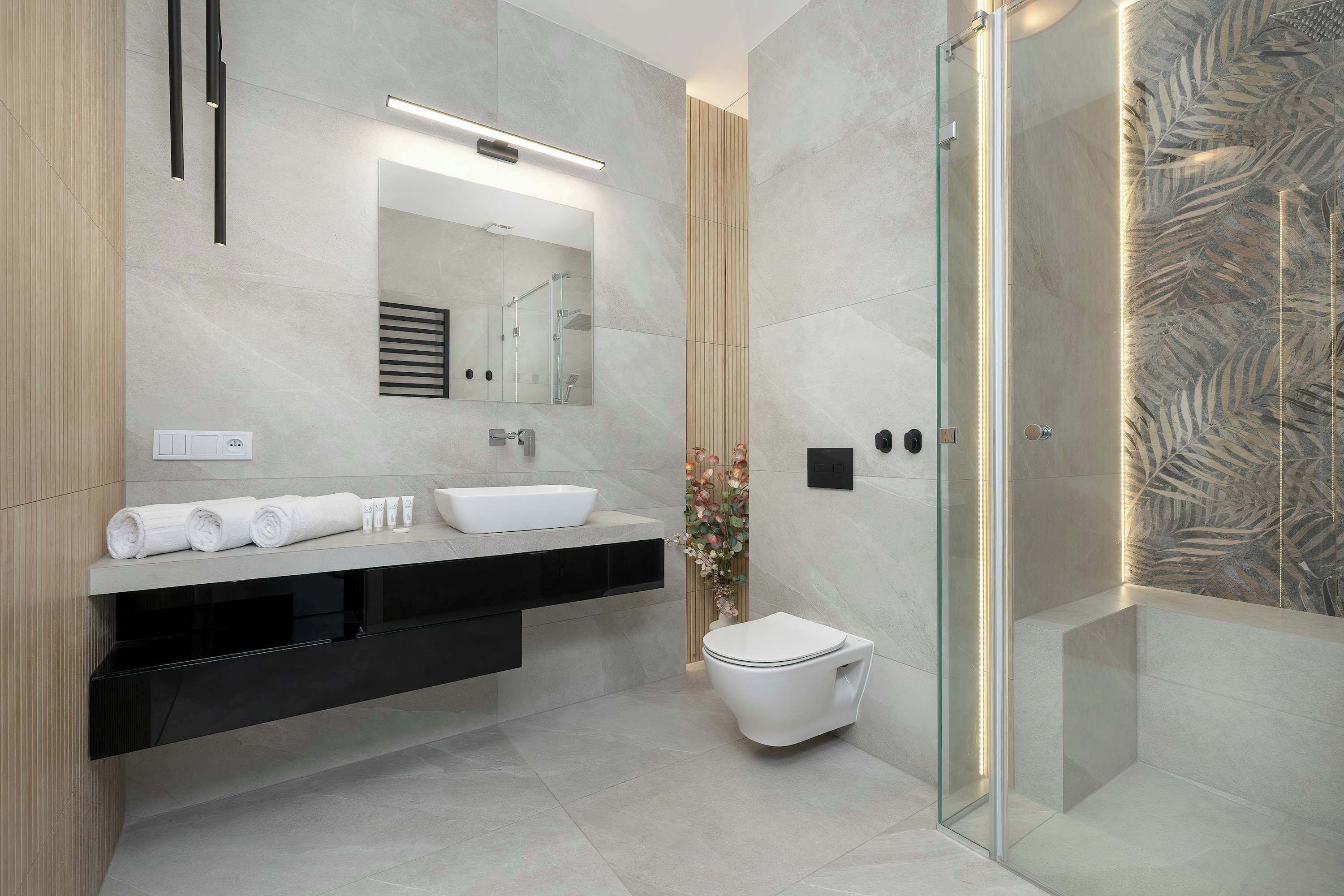 Shower, hair dryer, towels, shampoo