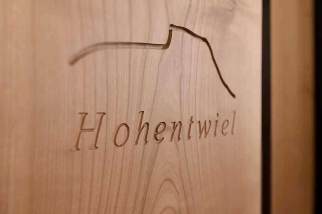 A wooden surface with the text "Hohentwiel" engraved.