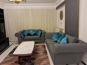 TV - Spacious 3-Bedroom Apartment with balcony in Abbas el akkad with City View (Cairo Governorate)