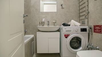 Hair dryer, towels, soap, toilet paper