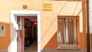 A hostel entrance with a sign reading "HOSTEL Martin" and a number "17" above the door. - Hostel Martin (Koper)