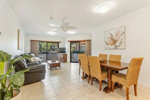 Three Bedroom Ocean View Apt Ground Floor | Living area | 32-inch flat-screen TV with satellite channels, Netflix