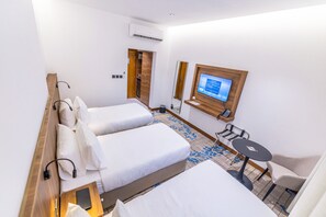 Standard Triple Room | Cribs/infant beds, free WiFi, bed sheets - Jasmine Garden Hotel Makkah (Makkah)