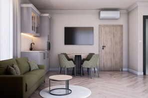 One-Bedroom Apartment Side Sea View | Living area | 42-inch Smart TV with cable channels - Casa dell'Eleganza Event Hall & Hotel (Kranevo)
