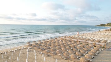 Private beach, sun loungers, beach umbrellas, beach bar