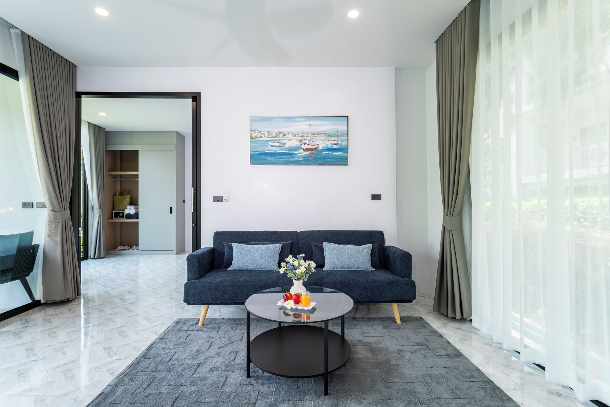 Deluxe Villa | Living area | 32-inch LED TV with cable channels