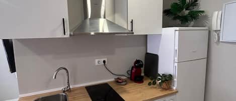 Fridge, microwave, stovetop, coffee/tea maker