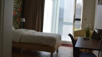 Comfort eenpersoonskamer, uitzicht op tuin