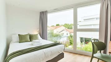 Habitación doble superior, vista al jardín | Escritorio, espacio para trabajar con laptop y wifi gratis