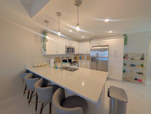 Private kitchen - The Nautical Nook by Anchored Acres / Themed 3BR Getaway (Lehigh Acres)