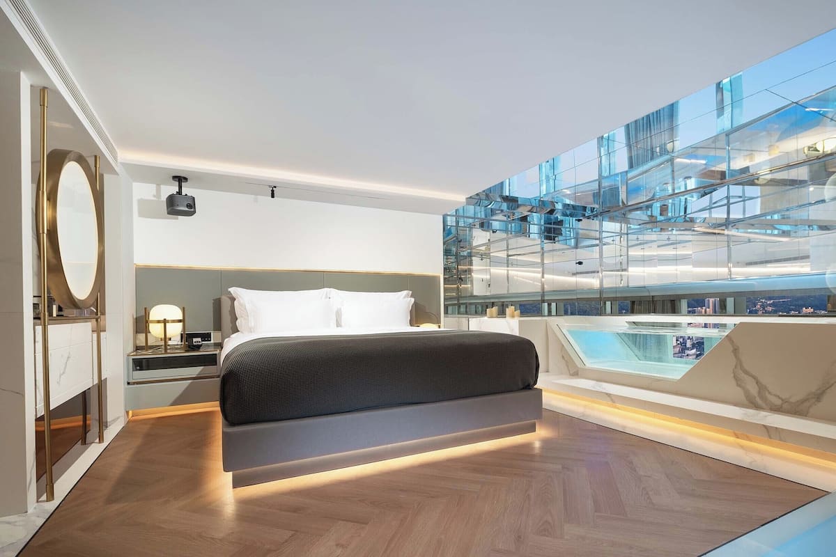 Luxury Suite, City View | In-room safe, blackout drapes, soundproofing, iron/ironing board