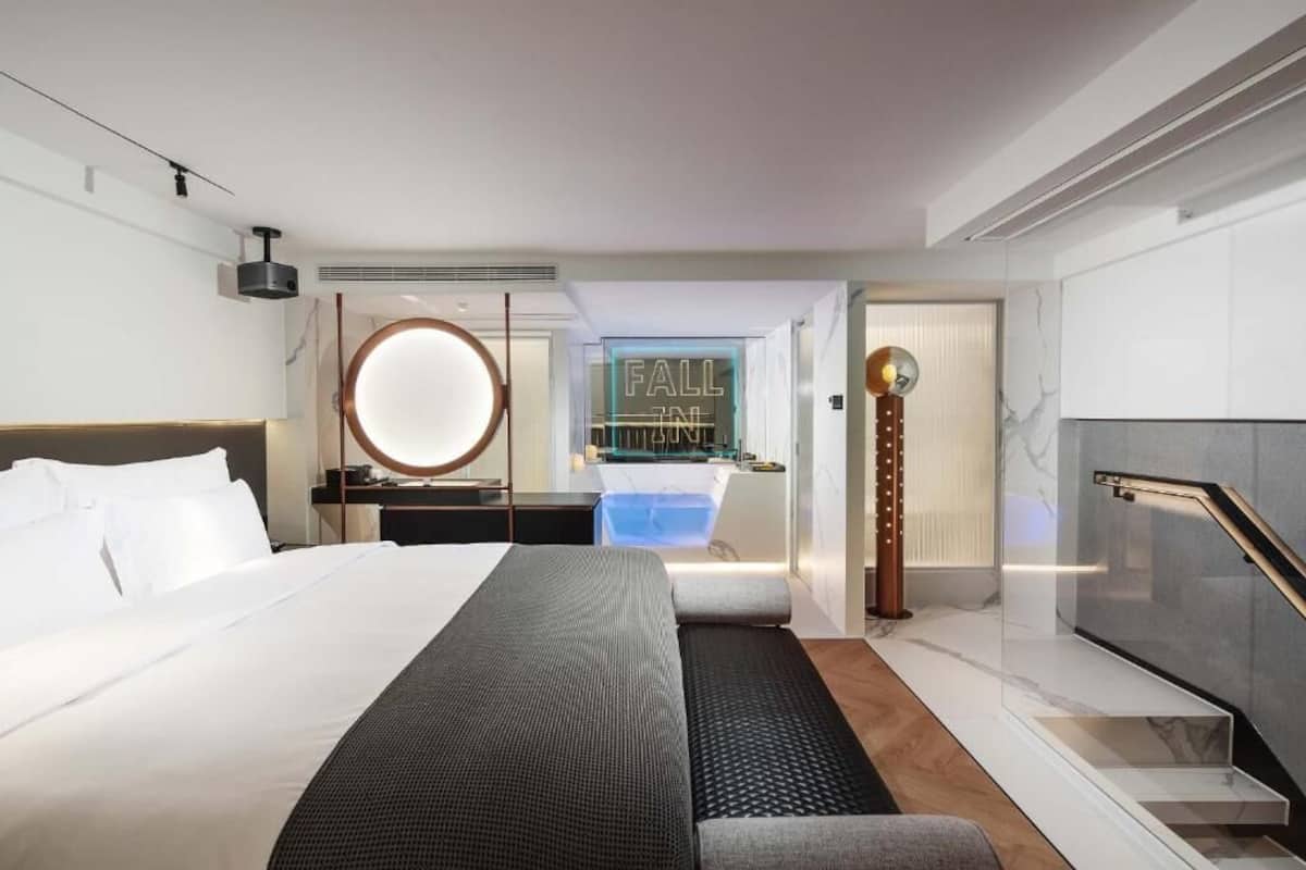 Family Room, City View | In-room safe, blackout drapes, soundproofing, iron/ironing board