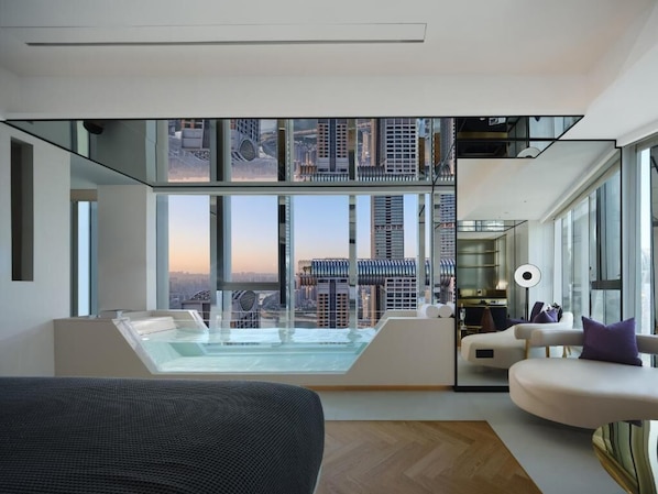 Suite Deluxe, bain à remous, vue fleuve