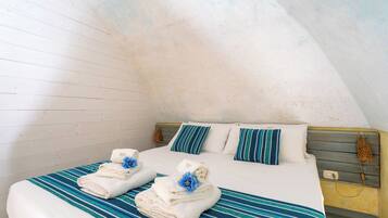 Double Room, Courtyard View | Minibar, blackout drapes, iron/ironing board, free cribs/infant beds