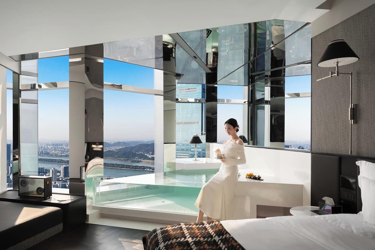 Elite Room, River View | In-room safe, blackout drapes, iron/ironing board, free WiFi