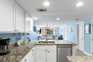 Family Condo, 2 Bedrooms, Balcony, Pool View | Private kitchen | Fridge, microwave, oven, stovetop - The Whaler Condos (Gulf Shores)