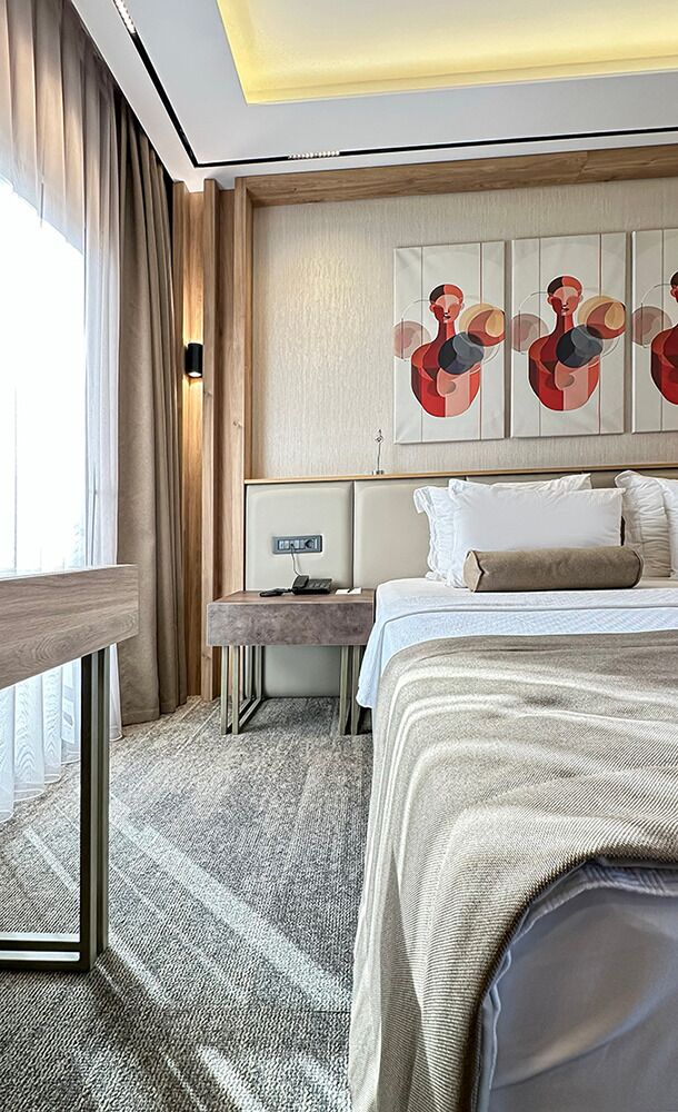 Standard Double Room, Balcony, Partial Sea View | Minibar, in-room safe, desk, laptop workspace