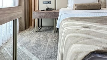 Standard Double Room, Balcony, Partial Sea View | Minibar, in-room safe, desk, laptop workspace