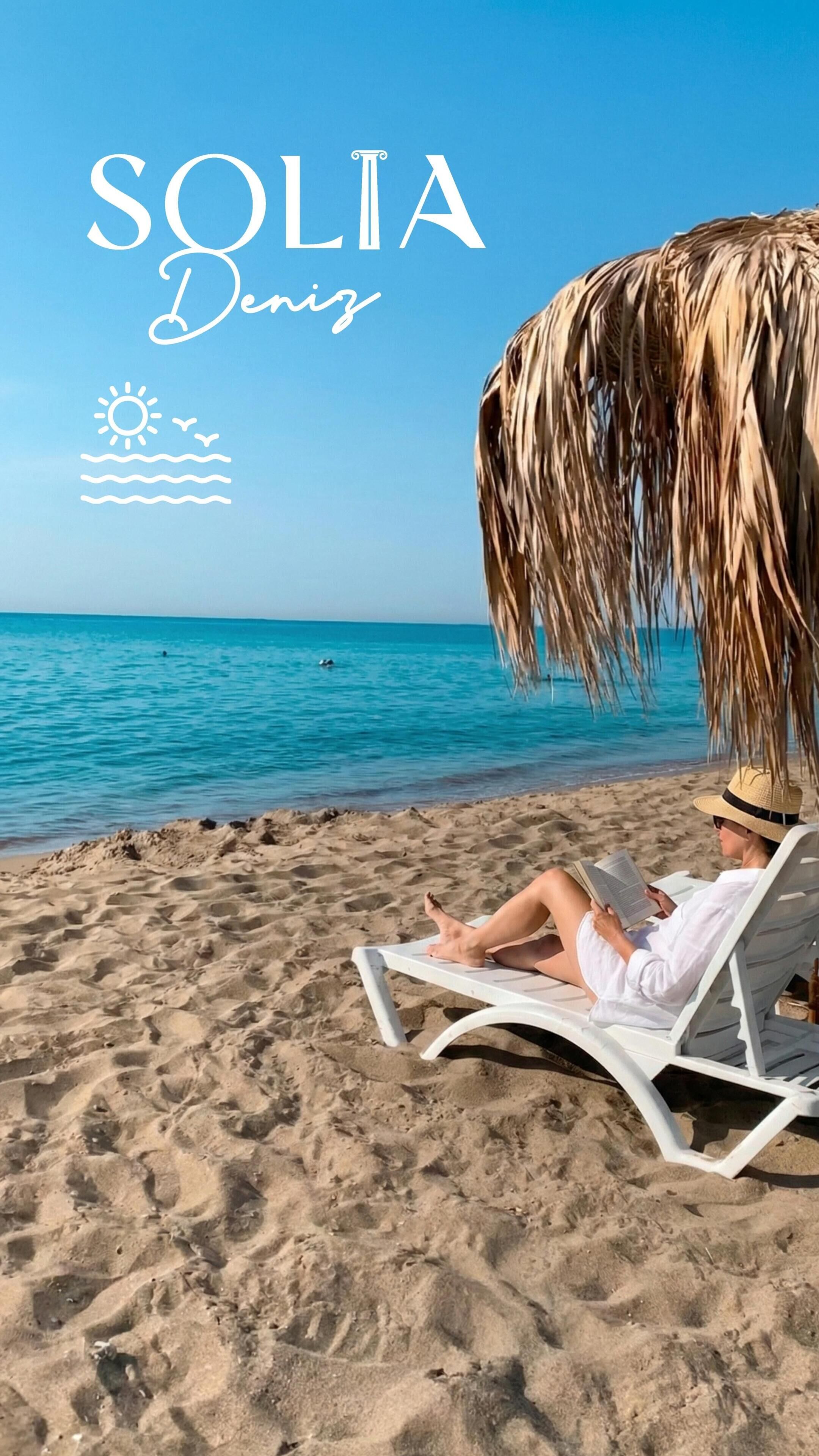Sur la plage, serviettes de plage
