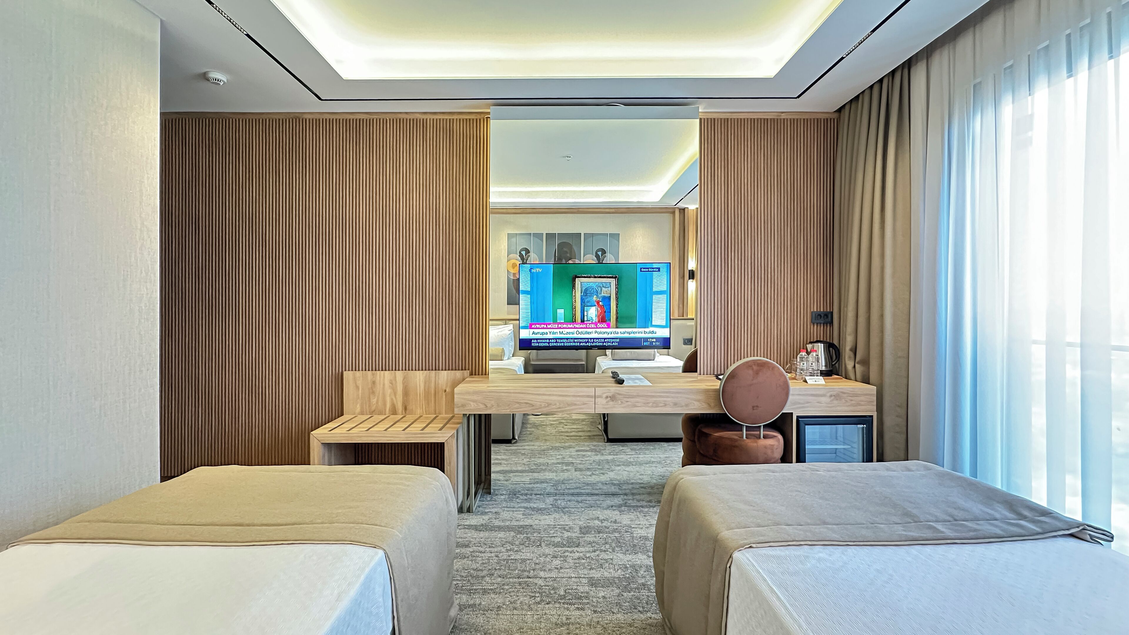 Standard Twin Room, Balcony, Partial Sea View | Minibar, in-room safe, desk, laptop workspace