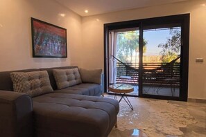 Living area - Sunny Marrakech Retreat | Stylish Apartment with Rooftop Pool & Padel Courts (Marrakesh)