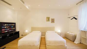 Coffres-forts dans les chambres, fer et planche Ă repasser