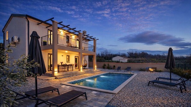 A two-story house with a swimming pool, outdoor seating, and a pergola. - Villa Lumina Divina-Modern villa with Heated Pool (Prhati)