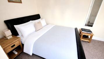 Iron/ironing board, travel crib, free WiFi, bed sheets