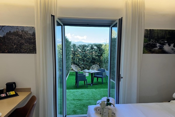 Camera Deluxe, 1 letto king, vista giardino | Vista giardino