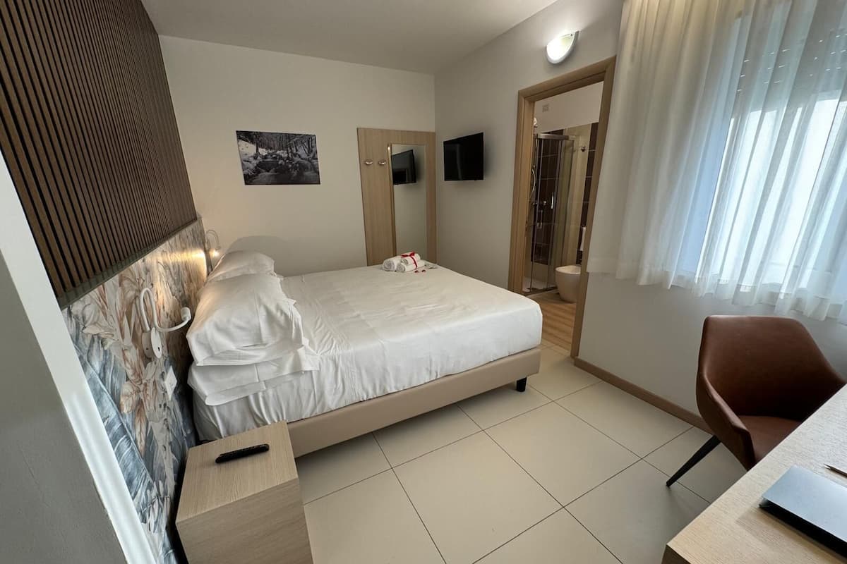 Standard Double or Twin Room | In-room safe, desk, laptop workspace, iron/ironing board