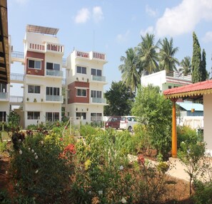 Unclassified image, 3 of 26, button - Gold Mountain Wellness Resort (Tiruvannamalai)