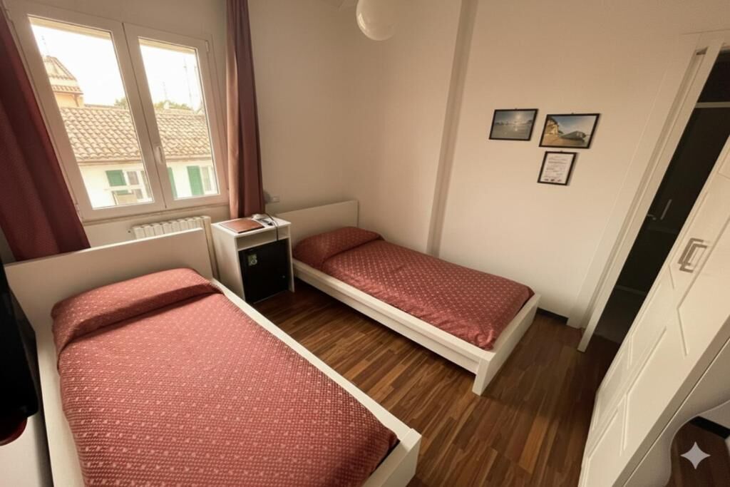 Chambre Économique avec lits jumeaux | Coffres-forts dans les chambres, rideaux occultants