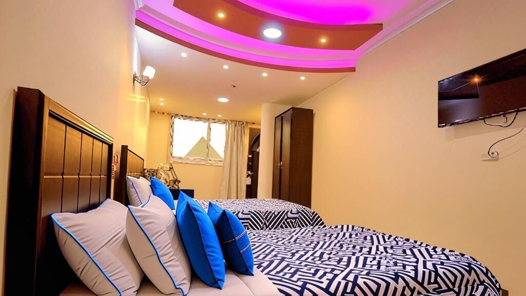 Deluxe Quadruple Room, City View