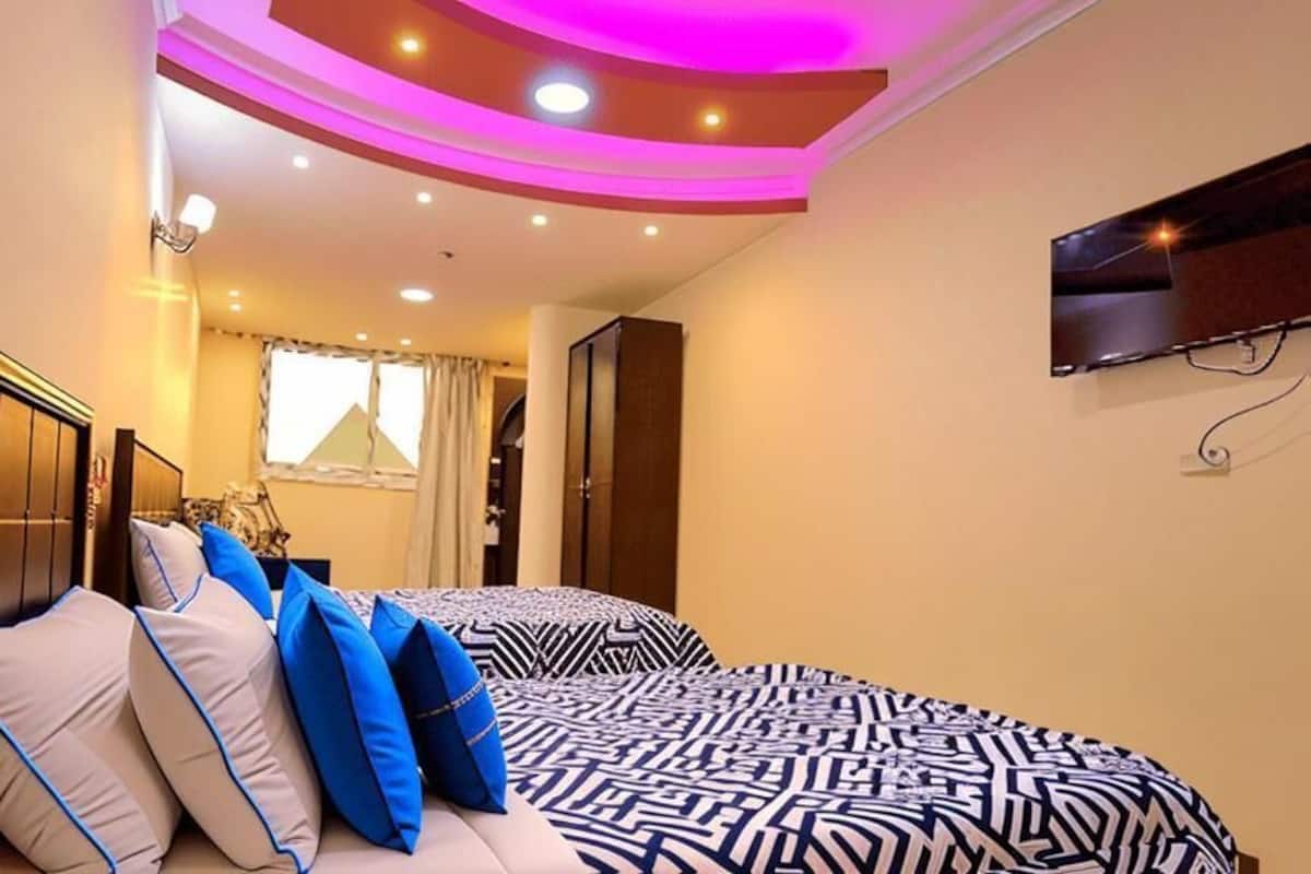 Deluxe Quadruple Room, City View