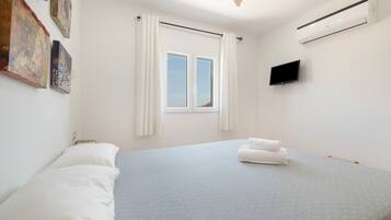 3 habitaciones, tabla de planchar con plancha, wifi y ropa de cama