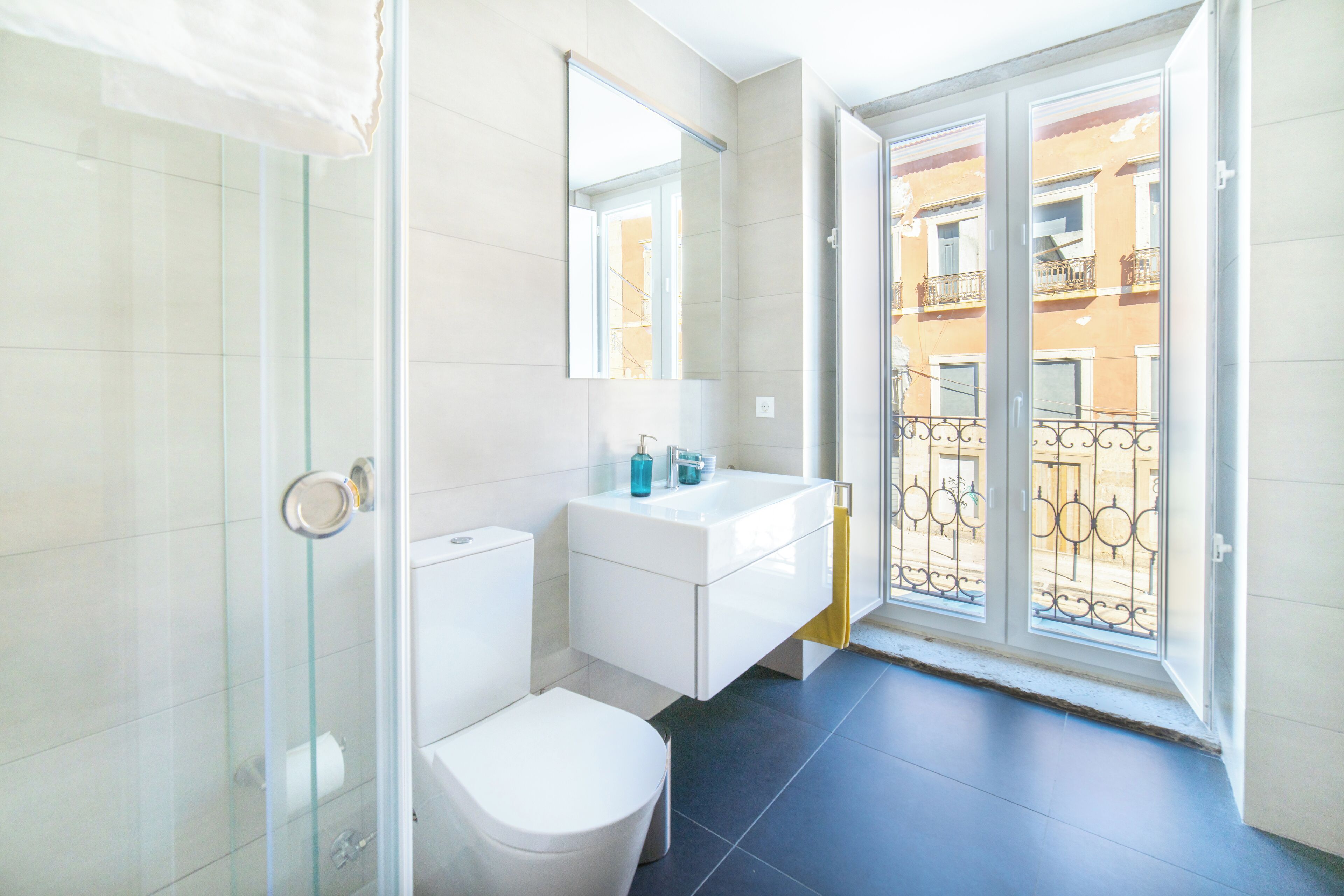 Blue by the River 2 - Deluxe Apartment | Bathroom | Shower, hair dryer, towels, soap