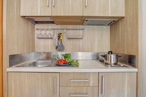 Standard Studio, Sea View (Residence Argentiera Studios 1F Sea) | Private kitchenette | Fridge, stovetop, coffee/tea maker, cookware/dishes/utensils - Residence Argentiera Apartments (Sassari)