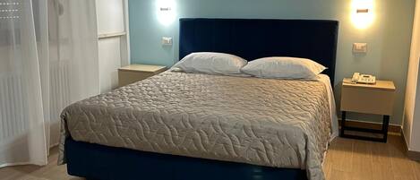 Chambre classique double ou avec lits jumeaux | AccĂšs au Wi-Fi (inclus)