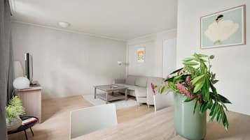 House, City View | Living area | Flat-screen TV