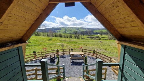 Luxury Glamping Lodge with hot tub set on a beautiful, Mid Wales hillside
