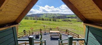 Luxury Glamping Lodge with hot tub set on a beautiful, Mid Wales hillside