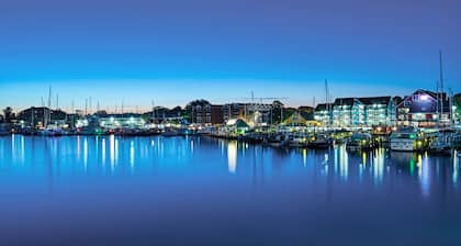 Charming brick home with patio, WiFi, AC, & W/D - walk to everything