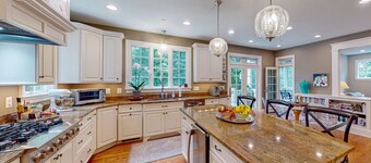 3-story home near river with patio, firepit, Ping-Pong, grill and wood fireplace