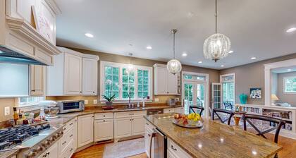 3-story home near river with patio, firepit, Ping-Pong, grill and wood fireplace